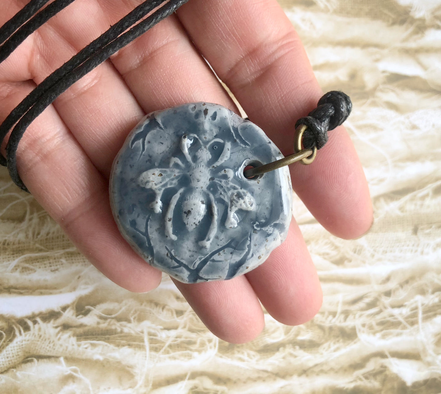 Rustic Carved Clay Queen Bee Cabochon glazed in Blue on Faux Leather Cord