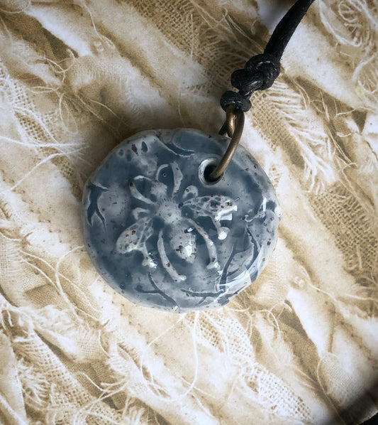 Rustic Carved Clay Queen Bee Cabochon glazed in Blue on Faux Leather Cord