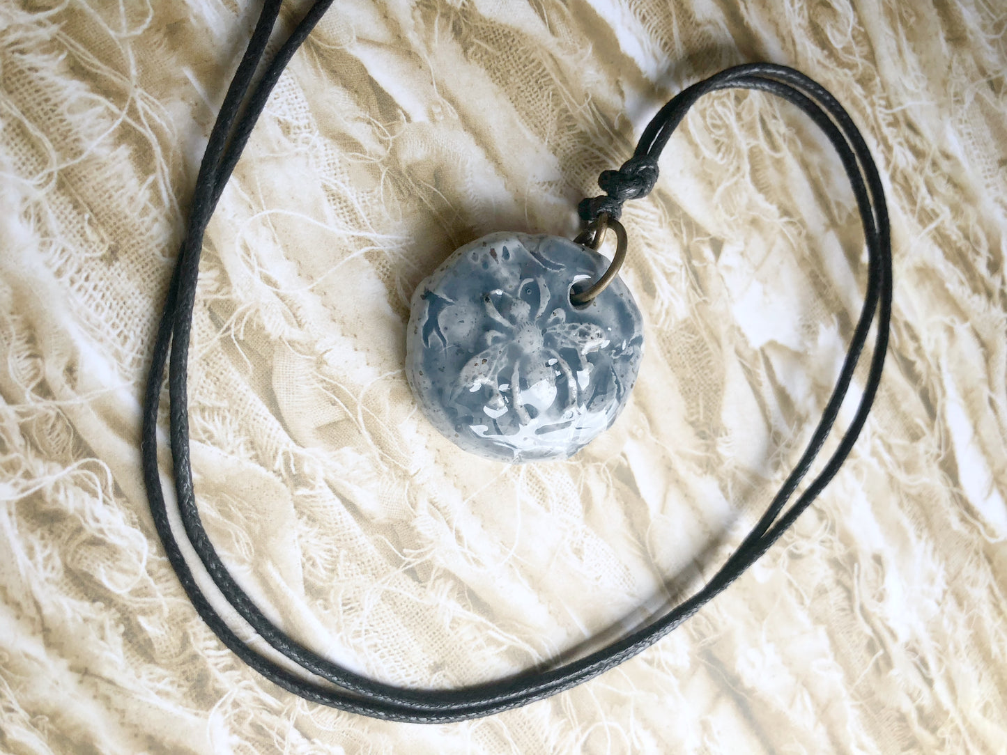 Rustic Carved Clay Queen Bee Cabochon glazed in Blue on Faux Leather Cord