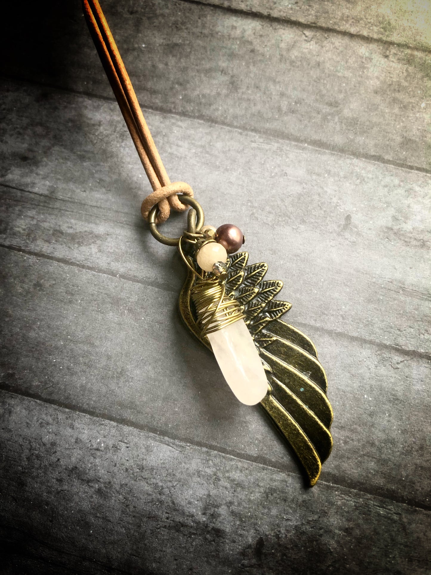 Large Brass Wing Pendant on Faux Leather Cord with Rose Quartz