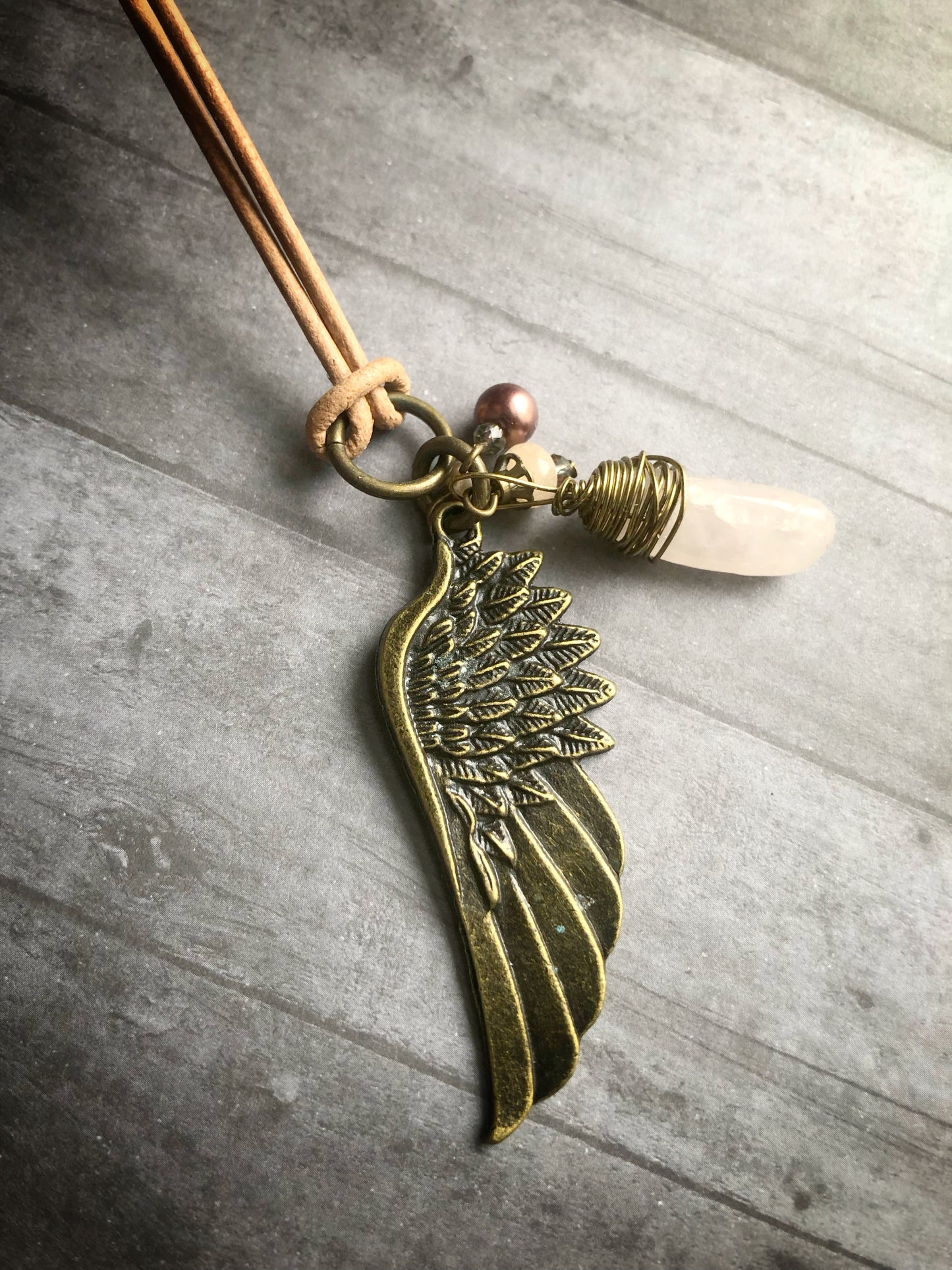 Large Brass Wing Pendant on Faux Leather Cord with Rose Quartz