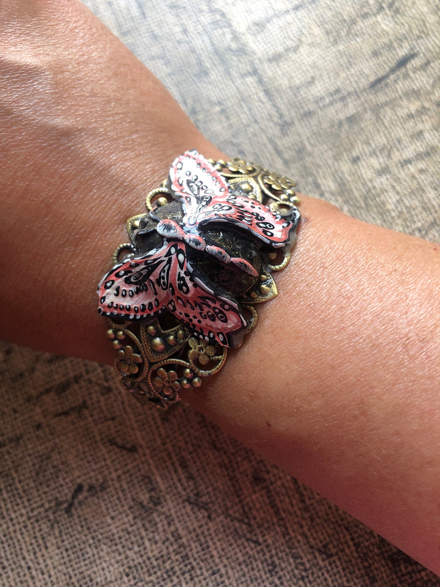 Carved Clay Butterfly on Filagree Cuff with Hand Painted Details