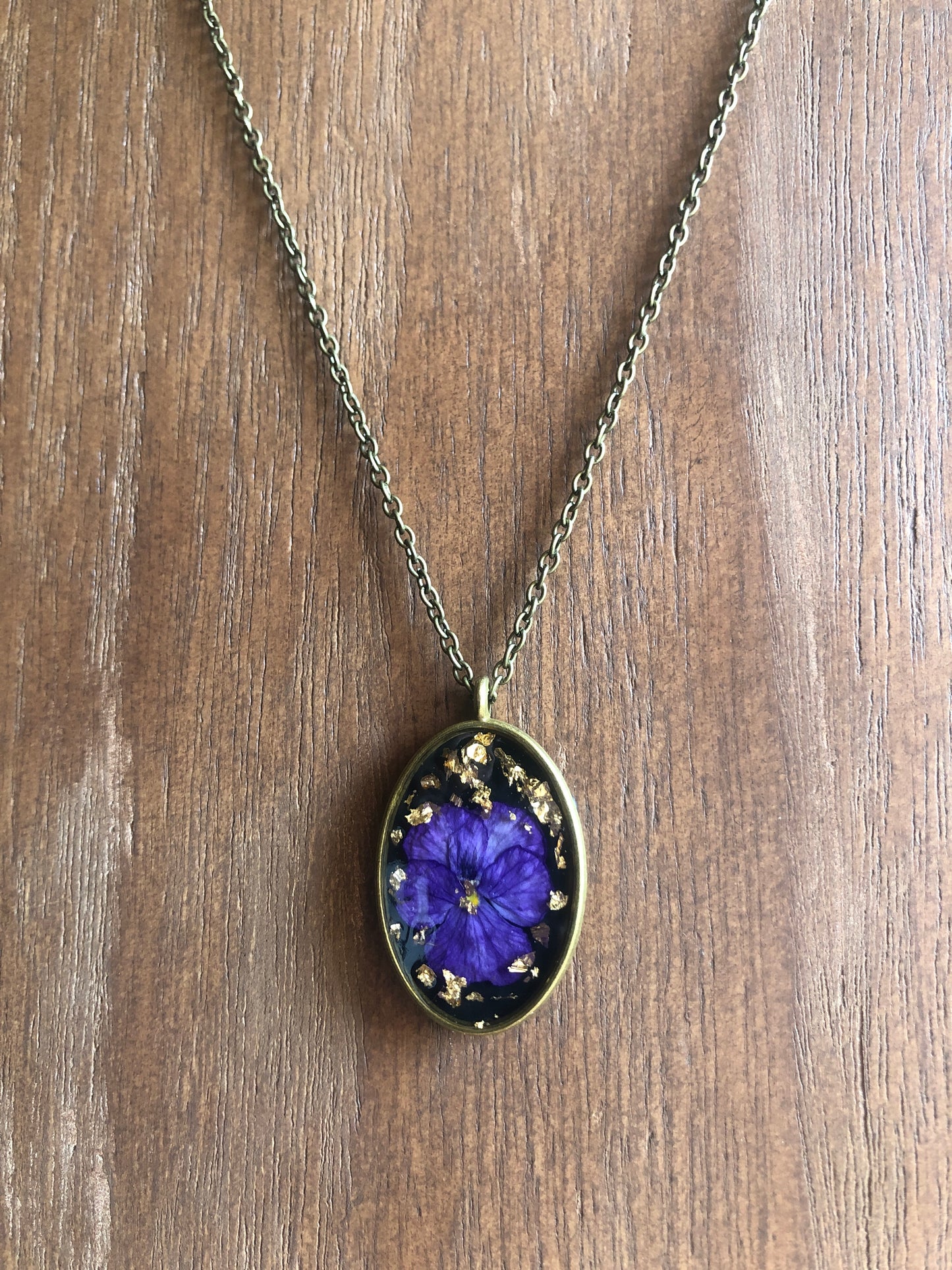 Purple Pansy on Black in Resin w Gold Flecks set in Brass