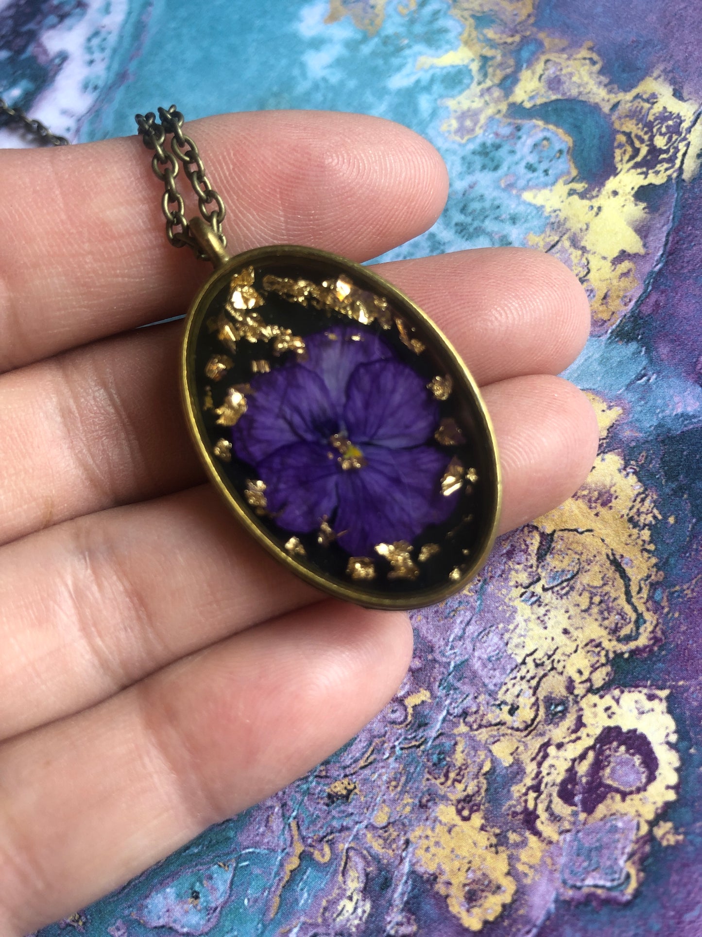 Purple Pansy on Black in Resin w Gold Flecks set in Brass