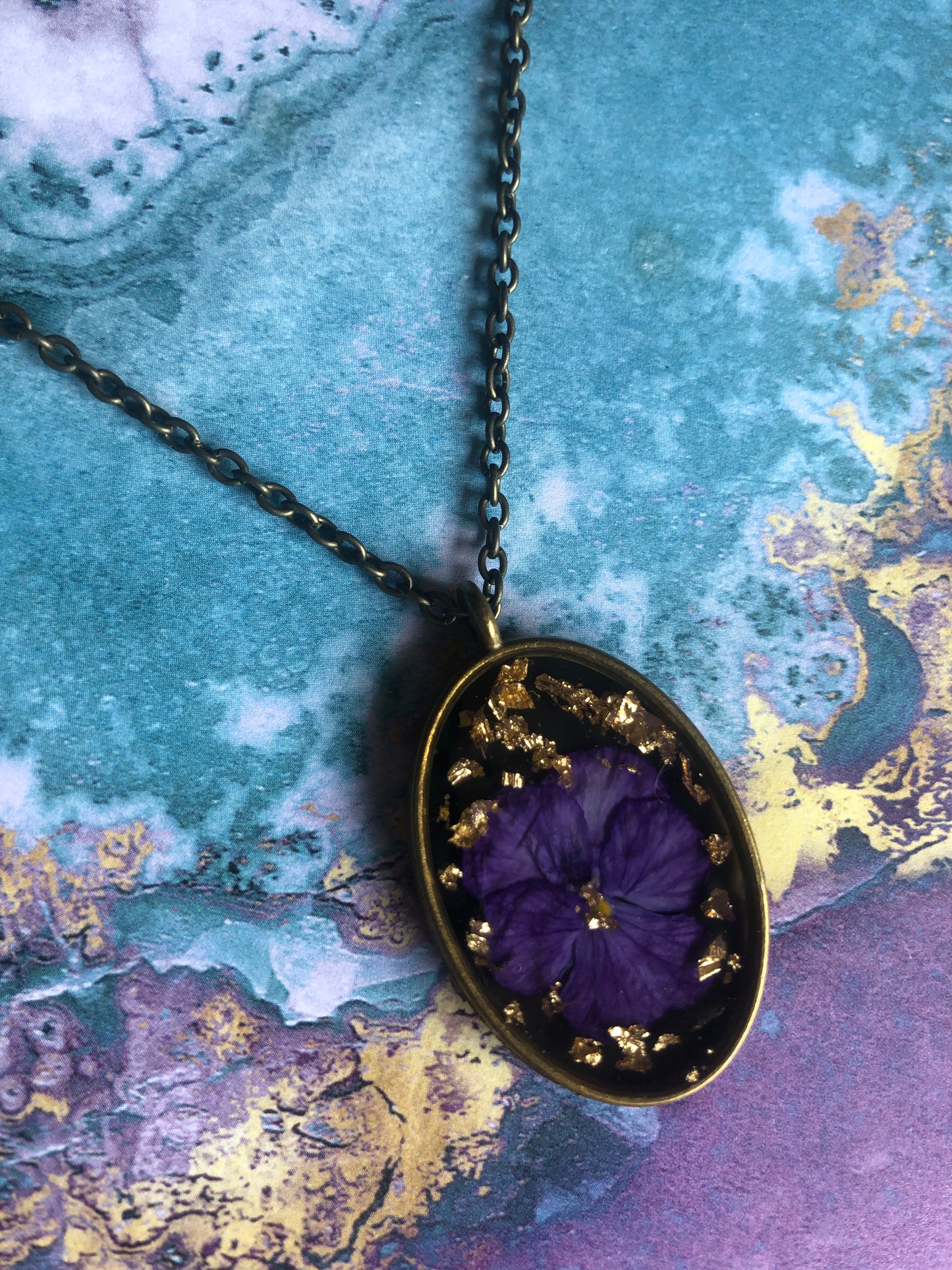 Purple Pansy on Black in Resin w Gold Flecks set in Brass